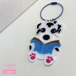 Charm dalmata con libro